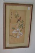 A pair of Chinese paintings on silk depicting birds and flora and butterflies and flora.