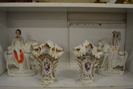 A pair of floral decorated vases and a pair of Staffordshire figures of the prince and princess of