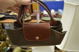 A small ladies' handbag.