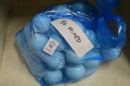 A bag of mixed golf balls.