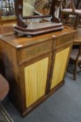 A Regency brass inlaid rosewood small chiffonier.