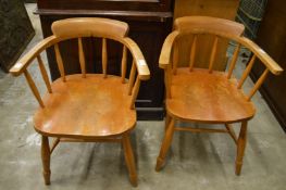 A pair of modern smokers' bow chairs.