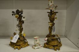 A pair of ormolu and porcelain naturalistic candlesticks (af).