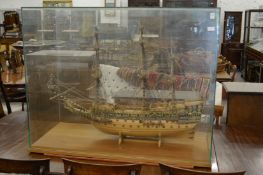 A good large model of the galleon 'Sovereign of the Seas', housed in a glass display case.