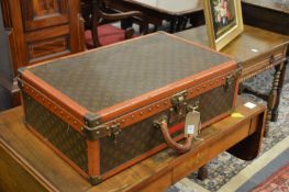 A Louis Vuitton suitcase.