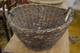 A wicker twin handled basket.