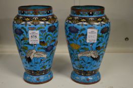 A pair of Japanese cloisonne vases (one damaged).