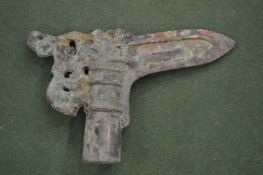 A Chinese bronze handle.