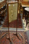 A small mahogany framed silk embroidered screen.