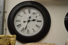 A wall clock.