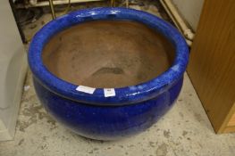 A turquoise glazed pottery jardiniere.