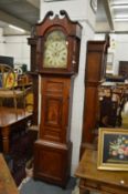 A 19th century mahogany longcase clock with painted arched dial.