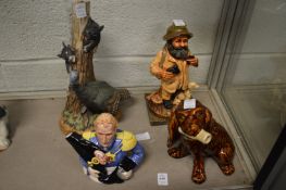 A novelty teapot and other items to include novelty decanters.