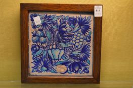 A framed Turkish pottery tile.
