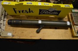 A brass spotting scope.