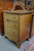 A small mahogany bow front four drawer chest.