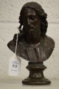 A small bronze bust of Jesus Christ.