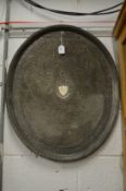 A large Eastern plated oval tray with engraved and pierced decoration.