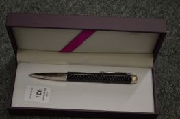 A stylish pen, boxed.