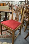 Two Chippendale style mahogany dining chairs.