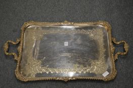 A large silver plated twin handled tray.