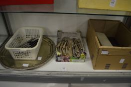 A quantity of plated ware to include a circular tray, flatware etc.