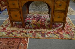 A Persian Milas rug, claret ground with stylised decoration 160cm x 110cm.