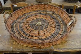 A wicker twin handled basket.