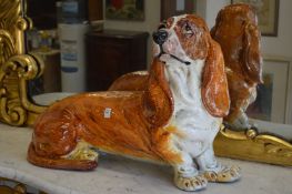 A large painted pottery model of a bassett hound.