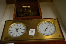 A desk clock/barometer and a reproduction sextant in a box.