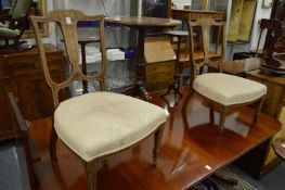 A pair of occasional chairs.