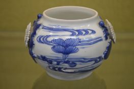 A small Japanese Hirado blue and white vase.