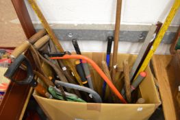 A quantity of gardening and other tools.