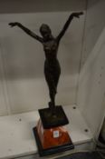 An art deco style bronze figure of a dancer on a marble base.