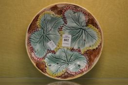 A Majolica plate.