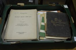 A box of sheet music.