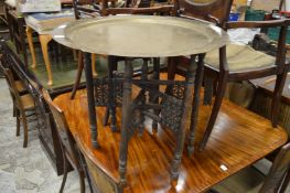 An Eastern brass tray table.