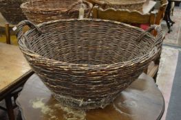 A wicker twin handled basket.