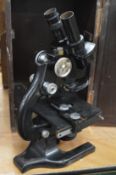 Cased microscope.