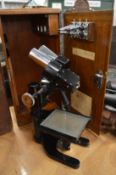 Cased microscope.