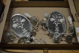 A pair of decorative wall lights.