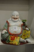 A colourful seated buddha.