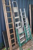 Various ladders access equipment, sawing horse.