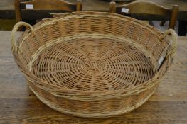 A wicker twin handled basket.