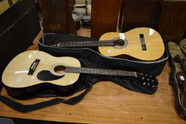 Two modern classical guitars.