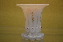 A Milch glass beaker.