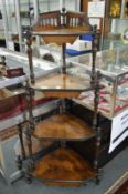 A Victorian walnut four tier corner what not.