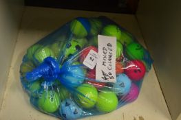 A bag of fifty mixed coloured golf balls.