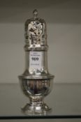 A silver sugar castor.