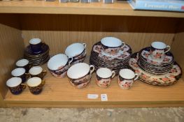 Imari decorated cups, saucers, and plates and a Doulton Park coffee service.